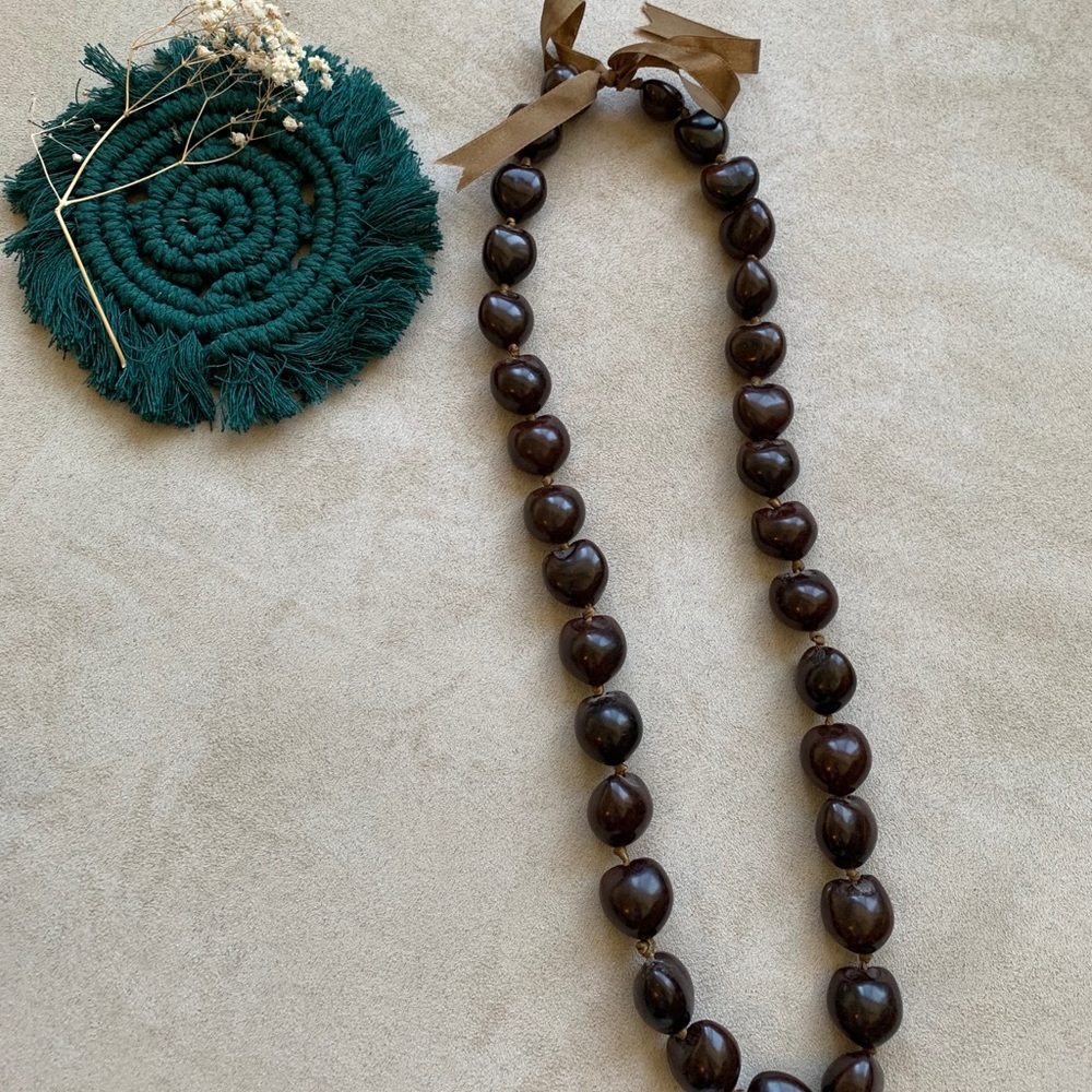 Brown statement necklace with ribbon